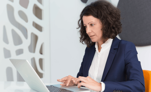 A translator working on urgent 24 hour translation, ensuring accuracy and fast delivery for clients in over 100 languages.