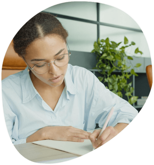 A university staff member assembles a translated admissions packet of academic documents using Winston Salem Translation.
