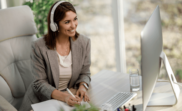 A professional working on transcription in Sacramento, converting recorded business discussions into accurate transcripts.