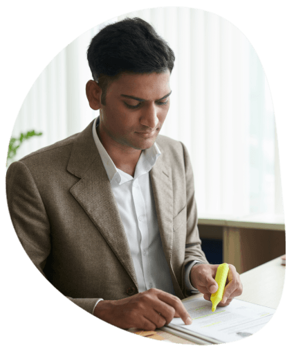 A translator reviews a policy and procedures handbook draft, providing Accurate Translation Services in Panama City for misc.