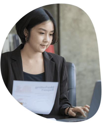 A business translator reviews a contract and highlights key clauses, offering industry Translation Services in Wichita.