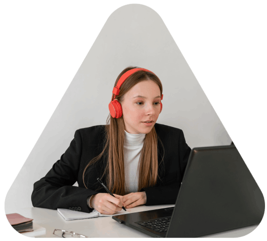 A transcriptionist marks pauses and filler words in a transcript, showing Verbatim Transcription Services that capture.