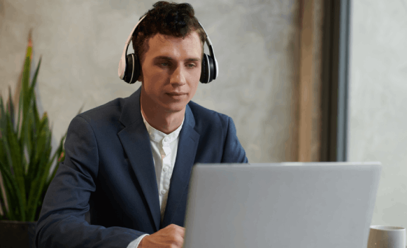 A transcript editor compares audio timestamps to a quote sheet, highlighting Verbatim Transcription's affordable pricing.