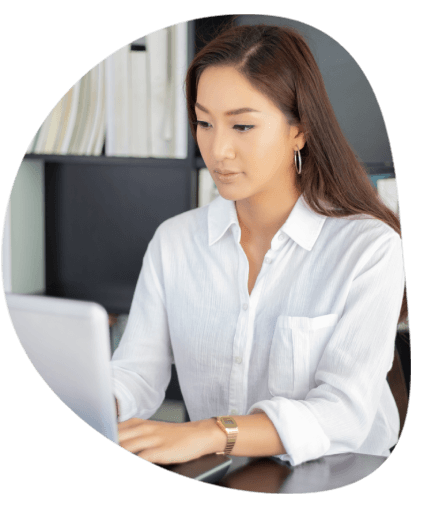 A project manager at Alexandria Translation, a translation company in Alexandria, Virginia, checks a bilingual document.