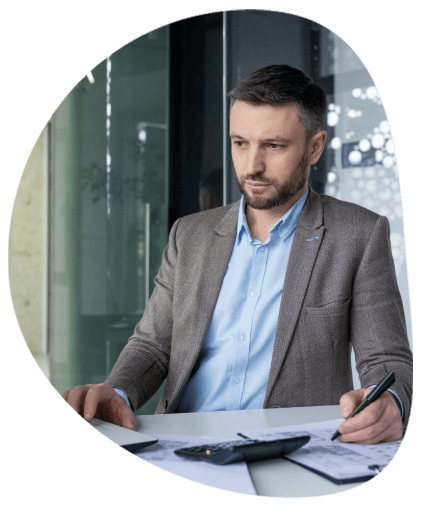 A business professional utilising Ann Arbour translation services to translate contracts and financial documents. A business professional utilising Ann Arbour translation services to translate contracts and financial documents.