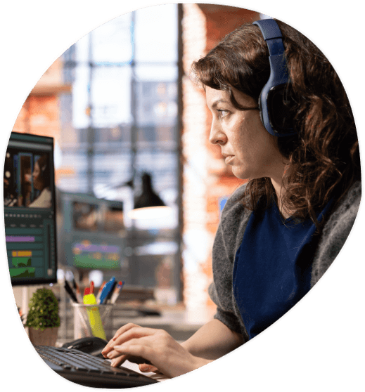 An editor creates time-coded subtitles from a webinar audio track, using Alexandria Translation Services for accuracy.