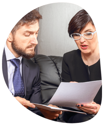 A manager emails a contract for review while Allentown Translation Services prepares a business document translation.