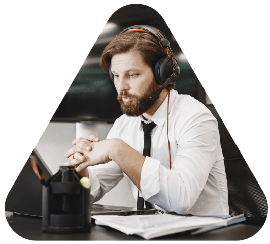 A translator adds timed captions on a corporate training video, delivering business Audiovisual Translation Services.