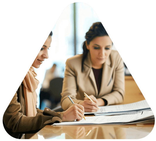 A Toledo account manager reviews a client brief, and Toledo Translation Services plans a business translation project.