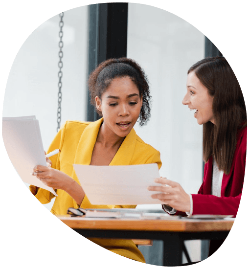 A small business owner reviews bilingual client emails as Allentown Translation Services translates correspondence.