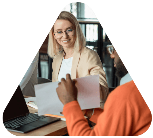 An office team reviews bilingual onboarding forms using Winston Salem Translation Services for individuals and businesses.