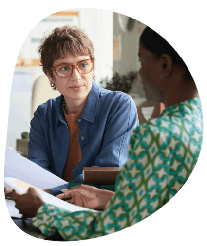 A parent reads a certified bilingual school notice as Educational Translation Services help families follow meeting details.