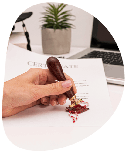 A translator providing a certified seal on a notarized document, showing Translation Services in Chattanooga for legal use.