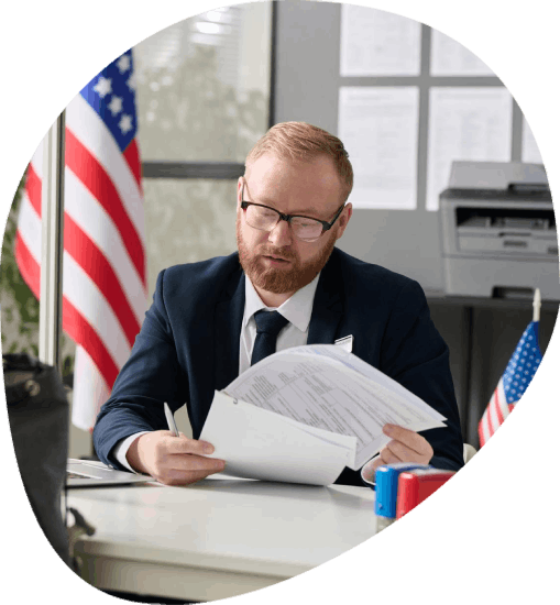 A certified translator checks a rush document set and delivers 24 Hour Translation Services for official submission.