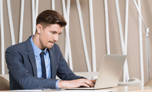 A professional retypes a printed report into an editable Word file, relying on Copy Typing Services to match layout.