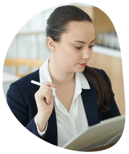 A linguist reviews a handwritten journal page, highlighting Translation Services in Stamford for creative and personal use.