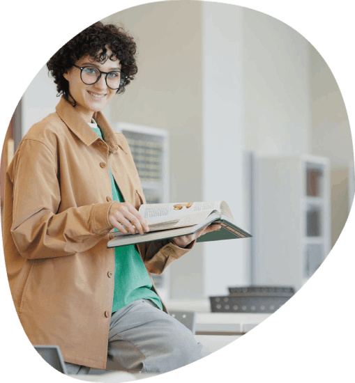 A translator updates a shared glossary so Educational Translation Services stay diverse yet consistent across syllabi.