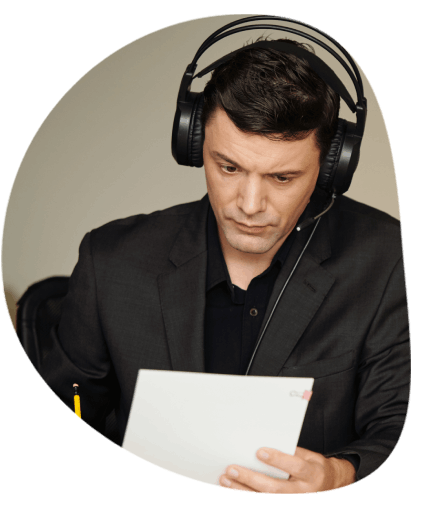 A translator is working on translating both documents and audio files in West Palm Beach, ensuring accurate delivery.