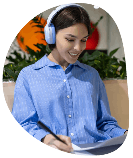 A localization specialist updates an e-learning course UI and captions as Educational Translation Services keep flow clear.