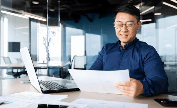 An editor proofreads a thesis draft, highlighting Educational Translation Services that keep academic work fast and secure.
