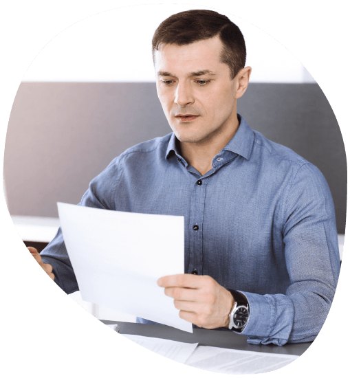 A project manager checks a file formats checklist for audio, video, and documents at Accurate Translation Services in Panama.