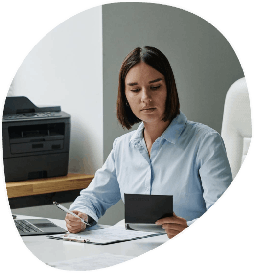 A specialist formats a visa application document set with 24 Hour Translation Services to mirror stamps and layout exactly.
