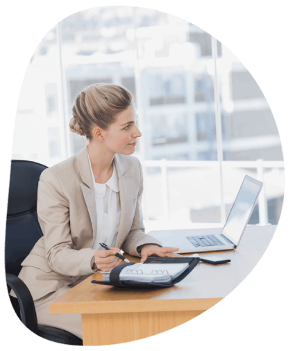 A consultant discusses pricing and turnaround at a desk, helping a client choose top-rated Translation Services.