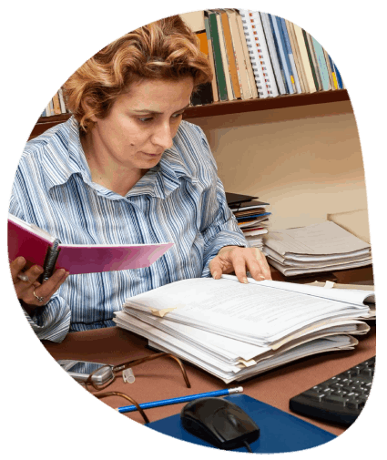 A university staff member updates translated institutional content on a web page.
