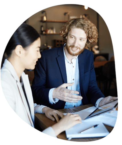 Translators assists an international client with business documents using Washington translation services for accuracy. Translators assists an international client with business documents using Washington translation services for accuracy.