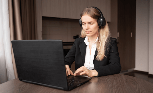 The professional Irish transcriptionist is transcribing a client’s academic interview with accuracy and confidentiality.