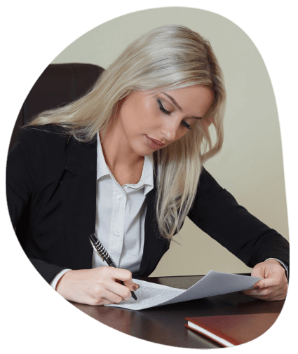 A paralegal reviews a court record as Toledo Translation Services translates legal exhibits and preserves tables and stamps.