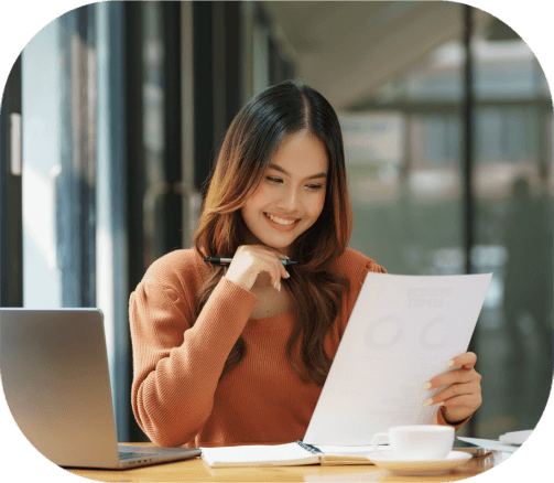 Native linguists collaborate at a desk, delivering multilingual accuracy and fast turnaround for Translation Services.