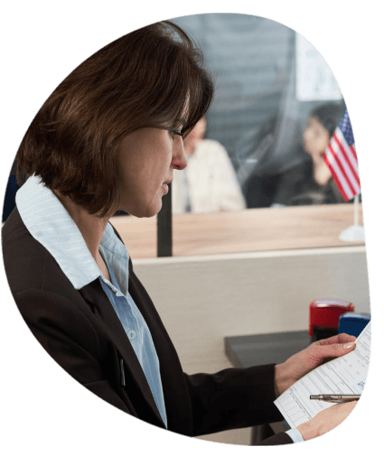 Translator compare bilingual pages as Toledo Translation Services runs quality checks on official business files.
