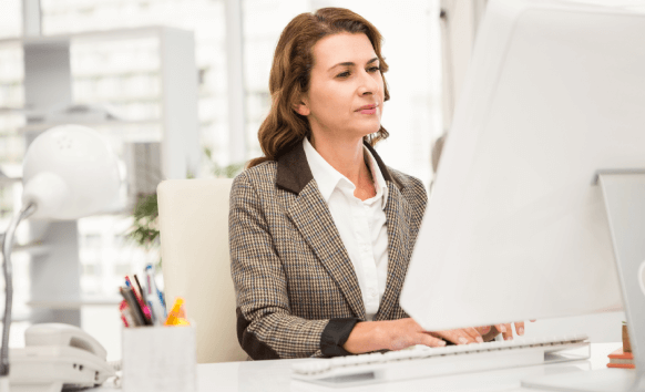 A typist working on converting a PDF to Word document for fast & accurate conversion using PDF to Word typing services US.
