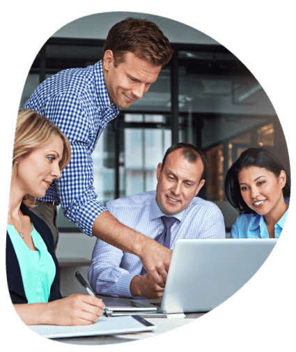A small team reviews a business proposal together, reflecting Translation Services in Hollywood and professionalism.