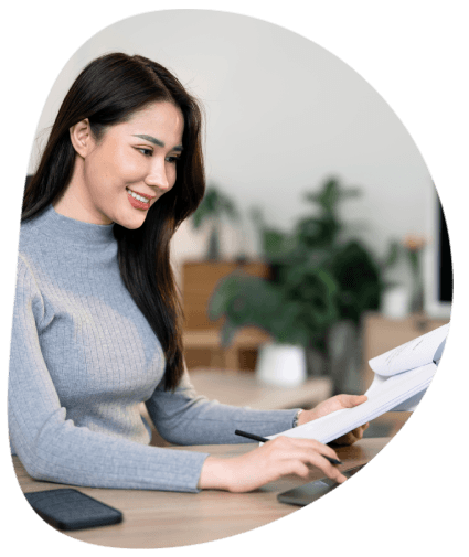 A linguist follows QA checks as flyer translation services verify prices, dates, and brand terms before launch. 
