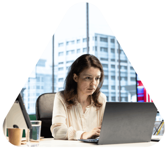 A project manager schedules a super rush turnaround on a laptop, securing Movie Translation Services as demand rises.