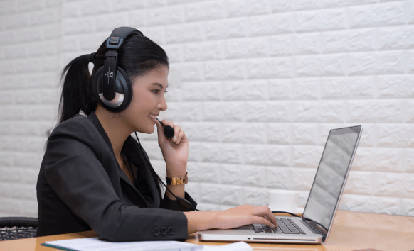 A transcriptionist working on Russian transcription services, ensuring high quality audio and video transcriptions.