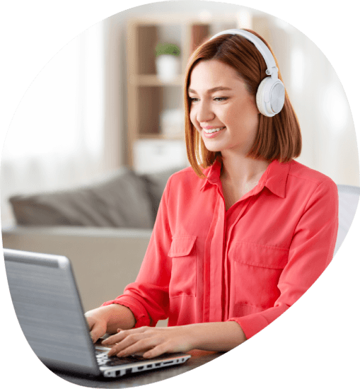 A transcriber uses a headset for Police Transcription Services while secure screens block views, protecting confidential.