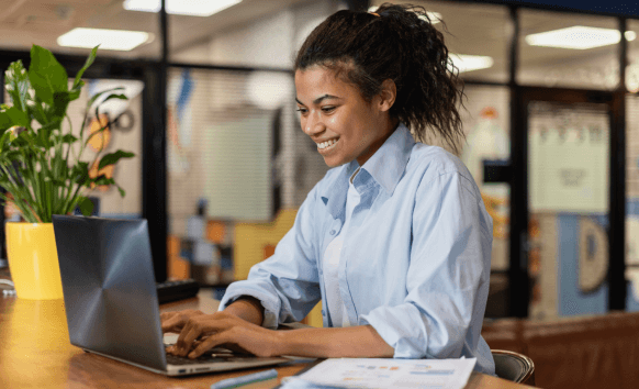 A translator working on documents for Tacoma translation services, ensuring quality and confidential services for clients.