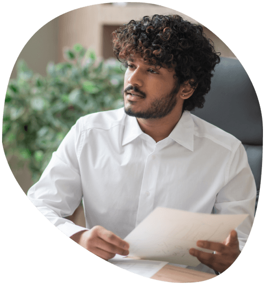 A specialist checks an export certificate translation against the original, highlighting specialized Translation Services.
