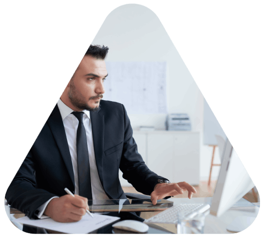 A certified specialist reviews a vital record at a Chattanooga translation company, preparing Translation Services.