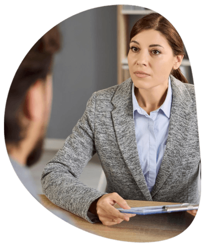 An ATA-certified linguist stamps a certified immigration translation as Winston Salem Translation Services readies a USCIS.