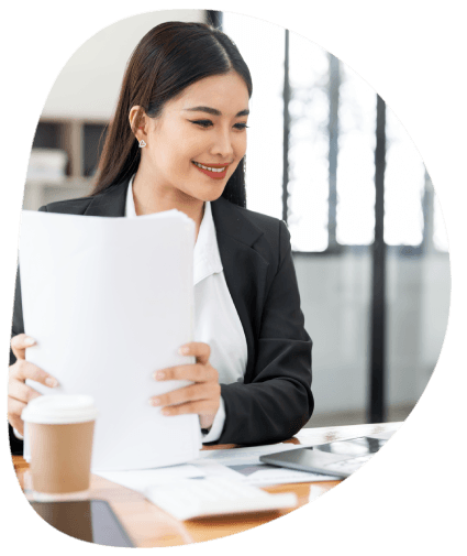 A translator prepares a USCIS certified packet with stamped pages for Translation Services in Naperville, Illinois.
