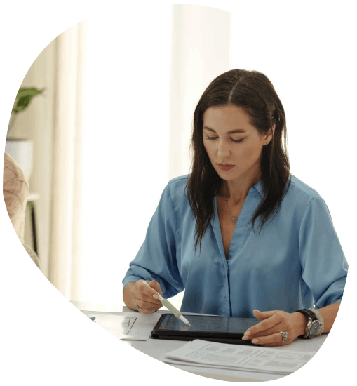 A translator aligns tables in a transcript, using Newport News Translation Services for varied content document layout.