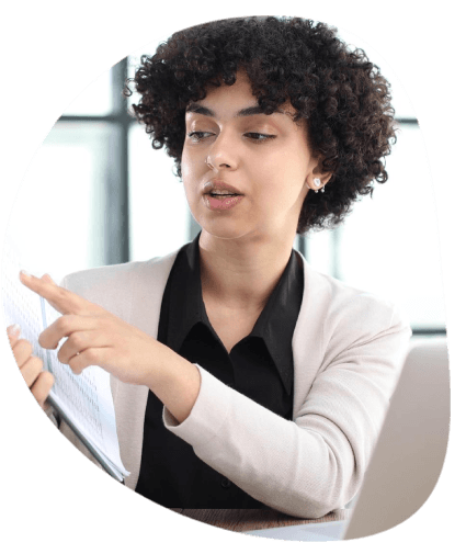 A project lead checks an industry glossary while Winston Salem Translation Services prepares specialized content.