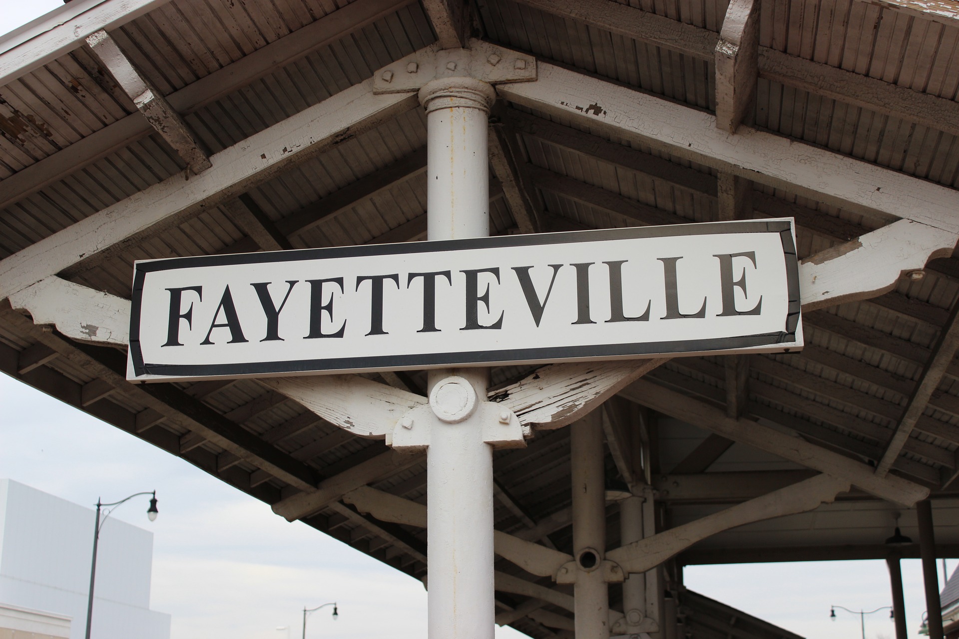 A white wooden & tiled roof is giving a traditional look to an old train station in Fayetteville.