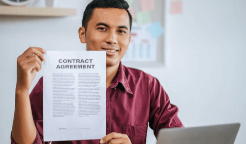 A professional holding a contract agreement